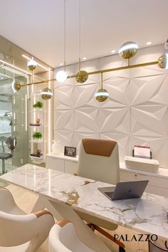 an office with white chairs and marble counter tops in front of a glass walled wall