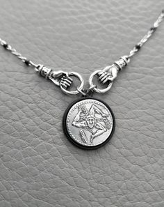 Trinacria Coin Necklace, Ancient Sicilian Three Legged Symbol Jewelry, Silver Black Triskelion Pendant, Italian Gift This beautiful pendant is made of exquisite handcrafted antique coin of Trinacria Trinacria is a traditional symbol of Sicily, it's composed of the head of the Gorgon Medusa It will make a beautiful and thoughtful gift for your loved ones. Will arrive in a gift box Silver plated replica coin, the chain is made of Stainless Steel Symbolic Handmade Coin Necklaces, Italian Gifts, Italy Gift, Godparent Gifts, Antique Coins, Star Chain, Gold Pin, Symbolic Jewelry, Name Gifts