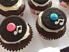 cupcakes decorated with music notes and icing