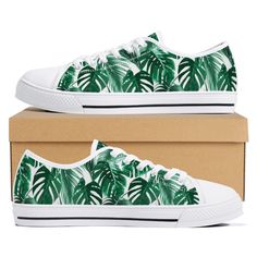 A unique and original pair of monstera sneakers, perfect for a summer vacation, boating on the lake or an afternoon bbq. These tropical jungle palm leaf shoes are a great addition to any wardrobe. These custom sneakers are printed canvas with rounded toe and lace-up closure for a snug, comfortable fit. Eyelets are metal for that classic look. The sneakers feature a soft textile lining with lightweight construction for maximum comfort and high-quality outsole for traction and exceptional durabili Casual Green Custom Sneakers With Speckled Midsole, Low-top Beach Sneakers For Summer, Low-top Sneakers For Beach In Summer, Summer Beach Low-top Sneakers, Custom Summer Streetwear Sneakers With Rubber Sole, Custom Summer Sneakers With Rubber Sole For Streetwear, Summer Streetwear Custom Sneakers With Rubber Sole, White Low-top Sneakers For Vacation, Summer Vacation Sneakers With Rubber Sole