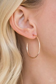 Rippling with diamond-cut shimmer, a dainty rose gold hoop curls around the ear for a casual look. Earring attaches to a standard post fitting. Hoop measures 1 1/4" in diameter.

Sold as one pair of hoop earrings. Trendy Fringe, Rose Gold Hoop Earrings, Dainty Rose, Rose Gold Frame, The Ear, Paparazzi Accessories, Blue Gems, White Rhinestone, Paparazzi Jewelry