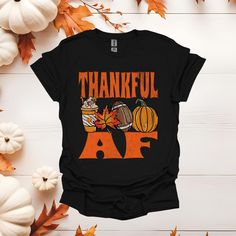 Celebrate Thanksgiving in style with this adorable Thankful AF Thanksgiving shirt! Whether you're attending a festive family dinner or a Friendsgiving gathering, this shirt is the perfect way to spread some holiday cheer. Made from soft and comfortable cotton material, it features a festive design that is sure to get you in the holiday spirit. Pair it with your favorite jeans or leggings for a cute and cozy Thanksgiving outfit. This shirt also makes a great gift for friends and loved ones who love the holiday season. Add this Thanksgiving shirt to your wardrobe today and enjoy the festivities in style! Welcome to BCoops Tees thank you for shopping! Like the shirt, but not ready to buy? Make sure to Favorite It so you can find it later!  If you want to see the other shirts we offer please g Cozy Thanksgiving Outfit, Autumn Dinner, Cozy Thanksgiving, Turkey Day, Family Thanksgiving, Fall Dinner, Thanksgiving Shirt, Fashion Autumn, Festive Design