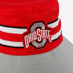 Stylish. Sporty. Simply supreme. Make sure you're ready for some fun in the sun with this Ohio State Buckeyes Team Stripe Boonie Bucket Hat. Features All-over, team-colored design so you can rep the team in style Embroidered team logo display, in case there were any doubts where your allegiances lie Top vent eyelets for optimal air flow and comfort Team-colored stripe accents on crown of hat for even more fashionable fandom Wide brim, versatile outdoor hat to keep you cool and comfortable Detail Sporty Bucket Hat For Sports, Summer Baseball Cap With Letter Print For Sports, Summer Sports Event Baseball Cap With Letter Print, Sporty Bucket Hat With Curved Brim For Sports, Sporty Adjustable Bucket Hat For Streetwear, Adjustable Sporty Bucket Hat For Streetwear, Sporty Visor Sun Hat For Sports, Summer Snapback Hat For Sports Events With Flat Brim, Summer Sports Snapback Hat With Flat Brim