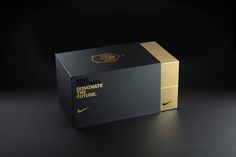 the box is black with gold trim and has a nike logo on it, as well as some other things