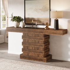 a living room scene with focus on the console table and painting in the background,