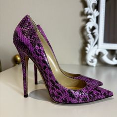 These Shoes Were Never Work Out Only Around The House. Size 38. Fit Is True To Size. Pink/ Purple Snake Skin. Very Fabulous Shoe. No Original Packaging. Purple 4-inch Heel Wedding Heels, Jimmy Choo Purple Heels, Purple Synthetic Heels With 4-inch Heel, Purple Peep Toe Heels, Purple Snake, Jimmy Choo Shoes, Fabulous Shoes, Snake Skin, Jimmy Choo