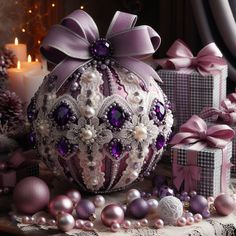 a christmas ornament surrounded by presents and candles