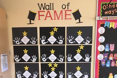 the wall of fame is decorated with handprints