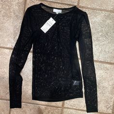 Long Sleeve Meesh Top Brand New Never Worn Fitted Black Mesh Top With Open Knit, Stretch Open Knit Mesh Top, Stretch Mesh Top With Open Knit, Fitted Black Open Knit Mesh Top, Black Fishnet Top For Fall, Fitted Mesh Top With Open Knit, Chic Fishnet Mesh Top, Fitted Mesh Open Knit Top, Black Nylon Mesh Top With Long Sleeves