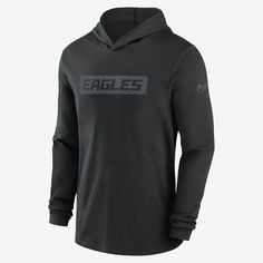 As a versatile layer for game day, the Philadelphia Eagles Sideline Top combines sweat-wicking technology with lightweight, stretchy fabric and a French terry lining for ultimate comfort. Its removable sleeve seams provide the option of a short-sleeve style. Black Sports Hoodie With Team Name, Sports Team Hoodie In Black, Nike Functional Sweatshirt For Sports Events, Nike Functional Sweatshirt For Sports, Black Sports Hoodie With Team Logo, Black Moisture-wicking Hoodie For Sports Events, Nike Technical Long Sleeve Hoodie, Technical Long Sleeve Hoodie For Sports Season, Nike Technical Hoodie