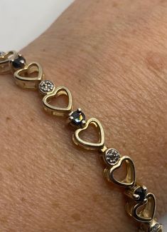 Vintage Diamond Sapphire Heart Bracelet Golden 925 Sterling Silver https://www.etsy.com/listing/1187710638/vintage-diamond-sapphire-heart-bracelet?utm_source=crowdfire&utm_medium=api&utm_campaign=api White Gold Diamond Heart Bracelet For Anniversary, Silver Heart-shaped Diamond Bracelet For Formal Occasions, Diamond Heart Bracelet With Accents, Diamond Heart Bracelet With Diamond Accents, Heart Shaped Diamond Bracelet With Accents, Fine Jewelry Heart Bracelet With Diamond Accents, White Gold Heart Bracelet With Diamond Accents, Silver Diamond Heart Bracelet As Gift, Formal White Gold Heart Bracelet With Diamond Accents