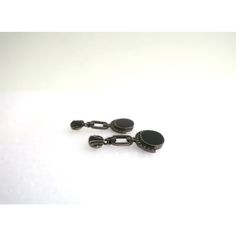 This is part of Chairish’s Fine Jewelry assortment.  A beautiful pair of black onyx and sterling silver Art Deco style dangle earrings, circa mid to late-20th century. A great pair to dress up or down. Each are marked on back 'Sterling' as shown in last three images. Excellent condition as shown in images. No issues. Dimensions: 1.5" Long. Elegant Black Oval Earrings, Classic Black Earrings For Formal Occasions, Classic Black Oval Earrings, Black Clip-on Jewelry For Formal Occasions, Timeless Oval Earrings For Evening, Vintage Oxidized Black Jewelry, Black Enamel Onyx Drop Earrings, Black Vintage Oxidized Jewelry, Classic Black Enamel Earrings For Formal Occasion