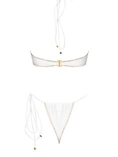 The June by Seashell Bikini is a halter bikini top with wrap around feature and adjustable neck tie that can be worn in various different ways. The Pearl in biscuit by Seashell Bikini is a brazilian tie side bikini bottom featuring versatile delicate strings and gold embellishments. The beauty and the value of this swimsuit linked to luxury are their rich fabrics and hand embroidery with gold seashells. As part of Seashell Bikini's Seashell collection, halter style bikini top and brazilian bikin Elegant Bandeau Halter Top For Beach, Elegant String Swimwear For Summer, Elegant String Swimwear For Beach, White Beachwear Halter Top For Party, Elegant Triangle Top Swimwear For Festivals, Seashell Collection, Gold Embellishment, Rich Fabric, Halter Style