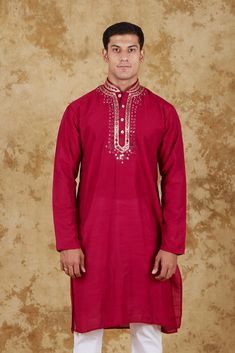 Bluesaanchi Mirror Magic Red Men's Kurta Set  The Bluesaanchi Mirror Magic Red Men's Kurta Set is a perfect blend of tradition and modernity. Crafted with exquisite attention to detail, this kurta set features intricate mirror work that enhances its appeal. Ideal for festive occasions or casual outings, it combines comfort with style, making it a must-have in every man's wardrobe.  Key Features  Elegant mirror work for a sophisticated look  Soft and breathable fabric for all-day comfort  Traditional design with a contemporary twist  Perfect for festive and casual occasions   Specifications  Brand: Bluesaanchi  Color: Red  Size Range: Available in multiple sizes  Pattern: Mirror work   Material & Care  Material: Premium cotton blend  Care Instructions: Hand wash in cold water, do not bleach Traditional Red Kurta With Dabka, Traditional Red Dabka Kurta, Bollywood Style Kurta With Traditional Patterns For Festivals, Traditional Kurta For Puja In Transitional Season, Designer Festive Kurta With Traditional Patterns, Transitional Season Straight Kurta With Traditional Patterns, Transitional Season Traditional Pattern Straight Kurta, Designer Bollywood Kurta With Traditional Patterns, Traditional Sherwani For Puja