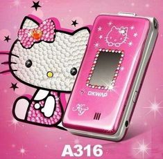 the hello kitty cell phone is pink and has a bow on it's head