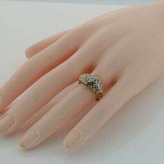 10K Yellow Gold 1 ct Diamond Cocktail Ring, 33 round stones set as a marquis in center wirth 3 stepped rows rounds, white gold center mounts, Ring size 7, Circa 1990, 3.7 grams Stock # BB227R12 This listing contains photographs of the actual item you will receive. Our items are in excellent condition with little or no signs of wear and many are one of a kind pre-owned estate finds. Please look closely at the pictures in this listing as they are part of the product description. Please read the de Cubic Zirconia Marquise-cut Multi-stone Diamond Ring, Marquise Cut Multi-stone Cubic Zirconia Diamond Ring, Multi-stone Cubic Zirconia Marquise Cut Ring, Marquise Multi-stone Diamond Ring, Marquise Cut Multi-stone Diamond Ring For Anniversary, Classic Marquise Multi-stone Diamond Ring, Classic Multi-stone Marquise Cut Diamond Ring, Classic Diamond Ring With Multi-stone Marquise Cut, Classic Marquise Cut Multi-stone Diamond Ring