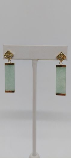 Green Jade Long Stud Earrings 14k Yellow Gold. Yellow gold 14k Long Rectangular Long Earring. Good Fortune Jade Earring for Great jade lover. Green Jade are a symbol of growth and vitality, which makes it a stone that stands for wealth and longevity. And it's not all about the Benjamin's, because when Jade instills prosperity in every aspect of your life, you lead a richer, more fulfilling existence. After all, money can only buy so much happiness. Product Info: -Earring Dimensions: 40x8mm. -Met Long Earring, Jade Earrings, Green Jade, Good Fortune, Jade Green, Gold Yellow, Long Earrings, Jewelry Earrings Studs, Solid Gold