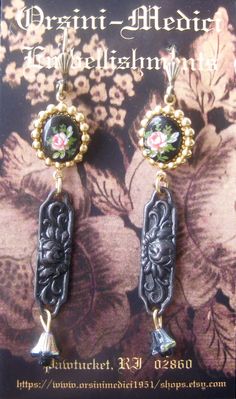 In this jewelry collection, my aesthetic focus was to evoke the Victorian and Edwardian era, of romanticized femininity, yet update it for todays fashion forward thinking woman. This pair consists of a repousse' stamping in the Victorian mourning style, and a floral transferware cabochon.  A tiny Czech glass floral bell finishes the length.  The gold plated brass, lever back wires are nickel free. FREE gift wrapping upon request!! Elegant Stamped Earrings As Gift, Antique Finish Vintage Earrings, Vintage Stamped Jewelry, Thinking Woman, Deco Beads, Steampunk Earrings, Victorian Steampunk, Forward Thinking, Edwardian Era