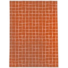 an orange rug with squares on it