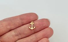 Anchor Charm 14k gold filled one sided, it's hollowed out in back They are lightweight perfect for earrings or charm bracelet. size: 11x8.5mm made in USA. package of 1 Piece  very fast shipping Via USPS, first class, 3-5 days. Gold Nautical Jewelry For The Beach, Gold Nautical Jewelry For Beach, Nautical Style Gold Jewelry For The Beach, Van Build, Anchor Charm, Nautical Anchor, Ocean Beach, Electronic Items, Gold Filled