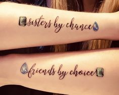 two girls with matching tattoos that say sisters by chance and friends by choice on their arms