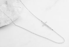 Sterling silver sideways cross necklace, necklaces for women, religious necklace, gift for her, silver cross, dainty necklace silver Silver sideways cross necklace D E T A I L S: *Sterling silver dainty sideways cross 9mm x 23mm *Sterling Silver chain- choose your perfect length at checkout SHIPPING: *Free domestic shipping on all orders PACKAGING: *All pieces come beautifully packaged, perfect for gift giving. . Find more to ❤️ here: http://etsy.com/shop/thejewelrystandard Silver Minimalist Cross Necklace With Clavicle Chain, Silver Cross Necklace With Delicate Chain, Silver Sterling Cross Necklace With Delicate Chain, Silver Cross Necklace With Delicate Chain For Gift, Sterling Silver Cross Necklace With Delicate Chain, Sideways Cross Necklace Silver, Dainty Jewelry Necklace, Sideways Cross Necklace, Cross Necklace Sideways