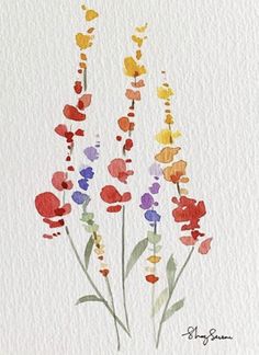 watercolor painting of colorful flowers on white paper