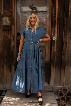 Effortlessly stylish and versatile, the Blue Ridge Denim Maxi Dress is your new go-to piece. It’s all about laid-back bohemian charm with a touch of chic that will transition perfectly from season to season! High-quality solid denim fabric Relaxed and loose silhouette at a maxi length Classic collared neckline with a button-up front closure Short sleeves with cute banded cuffs Flattering self-tie belt and tiers throughout for added boho style Pair with: High Neck Racerback Brami, Great Plains Az Chambray Dress Outfit Winter, Plus Size Denim Dress Outfit, Denim Dress Layering, Long Denim Dress Outfit, Chambray Dress Outfit, Denim Long Dress, Maternity Denim Dress, Stylish Mom Outfits, Long Denim Dress