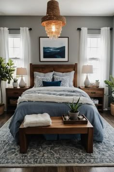 a bedroom with a bed, nightstands and plants in the corner on either side