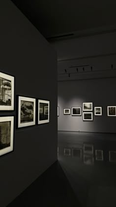 black and white photographs are hanging on the wall