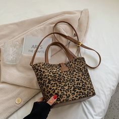 Panema Women's Small Leopard Handbag | Ultrasellershoes.com – Ultra Seller Shoes Casual Square Mobile Phone Bag, Casual Brown Phone Bag For Everyday Use, Casual Rectangular Satchel With Cell Phone Pocket, Casual Shoulder Bag For Daily Use, Casual Brown Shoulder Bag With Cell Phone Pocket, Casual Brown Shoulder Bag With Phone Pocket, Trendy Bucket Bag With Cell Phone Pocket For Travel, Casual Pouch Phone Bag For On-the-go, Fall Satchel With Mobile Phone Bag For Daily Use