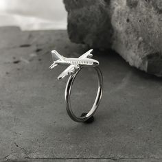 Welcome to our handmade jewellery shop! This rings is sterling silver 925'! This Airplane Rings is a perfect gift for a flight attendant, a pilot and a person who love to travel! In our workshop, the most important task is to make strong and reliable jewelry that will last you more than one year! Our accessories will be your consistent choice either it's an anniversary, birthday, or any other special occasion, because all of our jewelry are custom made by hand with LOVE and CARE! All of our jewe Airplane Ring, Aviation Jewelry, Airplane Jewelry, Travel Ring, Travel Bracelet, Airplane Pilot, Love Knot Ring, Jewellery Shop, Sterling Jewelry