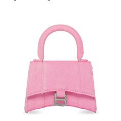 Authentic Pink Mini Denim Hourglass Top Handle Crossbody Bag From Balenciaga Brand: Balenciaga Model: Hourglass Market: Women’s Size: Mini Color: Pink Denim Original Retail Price: $1,290 Style: Studded Magnetic Closure, 1 Back Pocket, Comes With Strap To Make Into Crossbody Material: Nappa Lambskin Lining & Cotton Measurements: 1.7"W X 4.7"D X 3.9"H, Strap 21.6" Condition: Worn Once, Great Condition Comes With Original Dustbag, Smoke Free, Pet Free Home, Made In Italy Balenciaga Model, Pink Denim, Pink Mini, Home Made, Magnetic Closure, Mini Bag, Top Handle, Balenciaga, Crossbody Bag