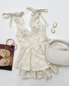 Beige Ruffled Bubble Romper For Summer, Beige Bubble Romper With Ruffles For Summer, Summer Beige Bubble Romper With Ruffles, Spring Party Jumpsuit With Bow, Sleeveless Beige Bubble Romper For Spring, Beige Sleeveless Bubble Romper For Spring, Spring Party Jumpsuits And Rompers With Bow, Chic Summer Jumpsuits And Rompers With Bow, Spring Beige Bubble Romper With Ruffles