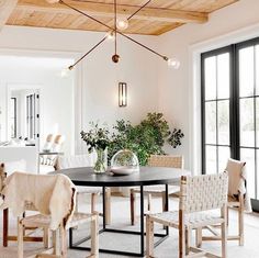 the dining room is clean and ready for guests to use it as an entertaining space