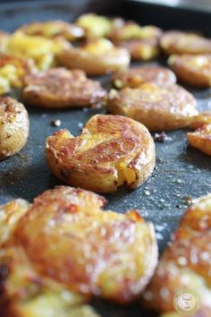 some food is cooking in a pan on the stove and it looks like they have been cooked