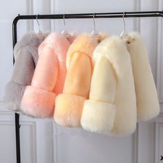 Trendy Fluffy Spring Fur Coat, Trendy Fluffy Fur Coat For Spring, Spring Fluffy Faux Fur Coat, Fluffy Faux Fur Outerwear For Spring, Trendy Spring Faux Fur Coat, Trendy Faux Fur Coat For Spring, Trendy Fluffy Fur Coat For Cold Weather, Trendy Faux Fur Coat With Faux Fur Lining, Trendy Faux Fur Coat With Lining