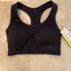 Brand New All In Motion Sports Bra With Tags Never Worn. Size M. Fits S To M. Removable Pads. Black High Stretch Seamless Sports Bra, Black Seamless Sleeveless Sports Bra, Black Stretch Sports Bra With Seamless Construction, Black Sports Bra With Seamless Stretch Construction, High Stretch Black Sports Bra With Seamless Construction, High Stretch Seamless Black Sports Bra, Black Nylon Sports Bra With Go-dry Technology, Black Nylon Go-dry Sports Bra, Black Seamless Stretch Sports Bra