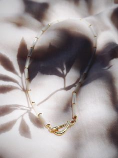 This white mother of pearl pikake shell necklace evokes visions of Hawaii's flower leis and reflect Hawaii's natural abundance. This unique beauty is ready for you and your tropical escape. ✦ DETAILS ✦✧ Name: Mau loa (maow LOah) - always and forever.✧ White Mother of Pearl beads.✧ 14kt Gold Filled clasp and beads.✧ All Ke Aloha Jewelry pieces come packaged thoughtfully, beautifully, and ready for gift giving. Delicate White Mother Of Pearl Jewelry, Spiritual White Mother Of Pearl Jewelry, White Single Strand Mother Of Pearl Beaded Necklaces, White Single Strand Mother Of Pearl Beaded Necklace, White Mother Of Pearl Spiritual Necklace, Elegant White Shell Necklace With Natural Stones, Spiritual White Shell Necklace, Delicate White Mother Of Pearl Necklace, White Mother Of Pearl Necklace With Natural Stones