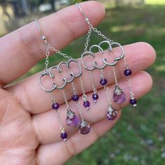 Wire wrapped earrings in sterling silver wire decorated with amethyst Faceted teardrop, and  faceted beads. Wrapped, hammered, and oxidized to give an antiqued look. Then polished to highlight the finished product.   Earrings length (not counting the ear wires): Length: 1 1/2 inch - 4.2 cm Wide: 3/4 inch - 1.9 cm Wire Wrapped love ♥ #wirewrappedlove Purple Amethyst Teardrop Earrings, Handmade Purple Sterling Silver Earrings, Purple Amethyst Drop Teardrop Earrings, Nickel-free Purple Dangle Chandelier Earrings, Purple Dangle Chandelier Earrings, Purple Gemstone Teardrop Dangle Earrings, Purple Sterling Silver Teardrop Dangle Earrings, Silver Amethyst Wire Wrapped Earrings, Handmade Purple Sterling Silver Chandelier Earrings