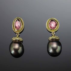 Enrich your look with these luxurious Pink Sapphire & Tahitian Black Pearl Earrings handcrafted from 18K Treasure Gold made with shipwreck treasure. Adorned with captivating rose-cut pink sapphires and enchanting Tahitian black pearls, each earring is intricately framed with delicate granulation for a truly exquisite finish. A unique find for your unique style! The beautiful pink sapphires weigh 2.02cttw and the pearls are approximately 9.4mm. Handcrafted in solid 18K gold made with 400 year-old Elegant Oval Tourmaline Earrings, Elegant Tourmaline Teardrop Earrings, Luxury Tourmaline Earrings As Gift, Luxury Tourmaline Earrings For Gift, Luxury Gold Tourmaline Earrings, Elegant Gold Tourmaline Earrings, Elegant Tourmaline Earrings For Formal Occasions, Elegant Tourmaline Drop Earrings, Elegant Tourmaline Earrings With Gemstone Accents