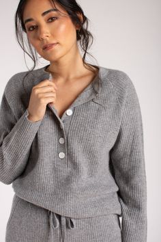 Meet the coziest pullover out there. The waffle knit long sleeve henley pullover is the ultimate transitional staple. With oversized buttons, a warm and cozy knit, it's as comfortable around the campfire as it is in front of a computer. – Loose, relaxed fit– Button-up henley style– Waffle knit– 100% CashmereSIZE & FITModel measurements: 5'6" tallModel is wearing US size Small Waffle Henley, Cashmere Pants, Around The Campfire, Cozy Pullover, Knit Sleeve, Cozy Knit, Henley Top, Cozy Knits, Pull On Pants