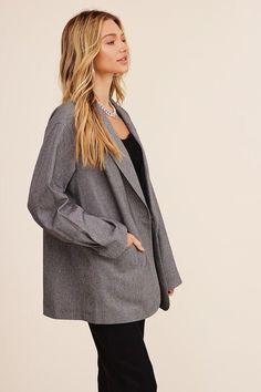 This blazer redefines elegance with its oversized silhouette that effortlessly bridges comfort and style. The welt pocket on the right front adds a touch of functionality and charm. The long sleeves offer versatility for various occasions, making it suitable for both formal and casual settings. With a clean and minimalistic design, the one-button closure provides a polished finish that complements the overall aesthetic. Model is 5' 9" 33-24-34 and wearing a size Small Fabric Contents: 57% Polyes Minimalistic Design, Oversized Silhouette, Overall Dress, Sheer Fabrics, Welt Pocket, Clothing Items, Brown And Grey, Shirts Tops, Style Casual