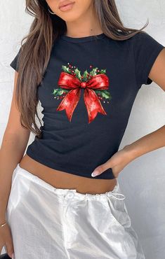 Christmas Coquette Bow Baby Tee, Christmas Season Crop Top, Christmas 2024 Tee, New year Tank Top,Christmas Light Coquette Bow Crop Top,FF75 🎉 Welcome to Feelky Tee! Your Custom Shirt Dreams Come True! 🎉 We are dedicated to making you smile! At Feelky Tee, we specialize in creating and customizing shirts exactly how you envision them. Our shirts make fantastic gifts for loved ones, family, coworkers, or even for yourself! If you can dream it, we can design it! Our shirts are ideal for bachelorette parties, special events, gatherings, and occasions like birthdays, anniversaries, and romantic celebrations. 🔧 HOW TO ORDER: 1️⃣ Pick Your Shirt Size & Color 2️⃣ Choose Your Text Color 3️⃣ Add Your Text/Personalization Request 4️⃣ Select the Quantity 5️⃣ Click "Add to Cart" 6️⃣ Wait for the Do Black Christmas Party Tops, Black Christmas Party Top, Black Tops For Christmas Party, Black Party Tops For Christmas, Festive Red Short Sleeve Tops, Black Christmas Festive Tops, Black Festive Christmas Top, Festive Black Christmas Top, Festive Black Christmas Tops