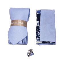 The Baby Blue Tie Set is the perfect tie set for any occasion. It comes with Cuff links. It also comes with a reversible handkerchief/ pocket square. These sets have been hand chosen by top designers to match Trending wedding colors. Everything is hand-selected to give you a unique look and everything comes perfectly presented in our gift boxes. Make sure you are wedding season ready with this one-of-a-kind set. ***If you need multiple for groomsmen sets (5 + ) please message or email us so we c Elegant Blue Summer Suits, Elegant Light Blue Wedding Sets, Elegant Summer Suit And Tie Accessories For Groom, Elegant Suit And Tie Accessories For Groom In Summer, Classic Blue Suit And Tie Accessories For Summer, Classic Fitted Sets With Ties, Elegant Blue Suit And Tie Accessories For Wedding, Dapper Blue Standard Tie, Blue Suit And Tie Accessories For Summer Business