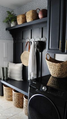 the laundry room is clean and ready to be used as a mudroom with lots of storage