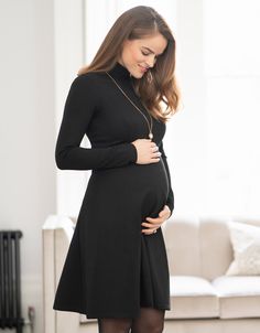 The classic black roll neck Vanessa maternity dress is an elegant style both during & after pregnancy & will be a staple in your maternity clothes collection! Elegant Maternity Dresses For Winter, Elegant Maternity Winter Dresses, Elegant Long Sleeve Bump Friendly Dress, Maternity Black Dress Bump Friendly, Maternity Black Bump Friendly Dress, Maternity Black Bump-friendly Dress, Black Maternity Dress Bump Friendly, Elegant Maternity Dress For Fall, Fitted Black Maternity Dress