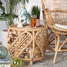 two wicker chairs sitting next to each other on top of a carpeted floor