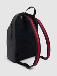 Height: 44cm Width: 28cm Depth: 15.5cm. Black GG Supreme canvas. Black leather trim. Blue and red Web. Cotton linen lining. Adjustable Web shoulder straps. Padded mesh back. Outside: 1 front zip pocket. Top handle with 5.5cm drop. Zip closure Red Web, Coconut Rice, Canvas Backpack, Pocket Top, Gucci Black, Gucci Men, Black Backpack, Leather Trim, Leather Trims