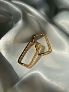 Elegant rectangular earrings, available in Silver and Gold Trendy Oblong Jewelry, Gold Cubic Zirconia Rectangular Pendant Jewelry, Elegant Rectangular Crystal Earrings, Gold Rectangular Earrings For Gift, Formal Gold Plated Rectangular Jewelry, Formal Rectangular Gold Plated Jewelry, Elegant Metal Oblong Earrings, Gold Rectangular Everyday Earrings, Gold Plated Rectangular Earrings